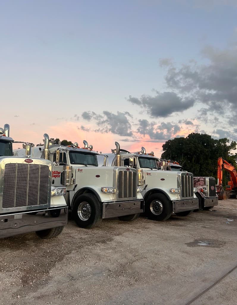 Detailed commercial semi trucks at sunset
